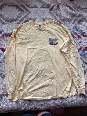 Comfort Colors Pale Yellow Long Sleeve Crewneck with Embroidered Chest Patch